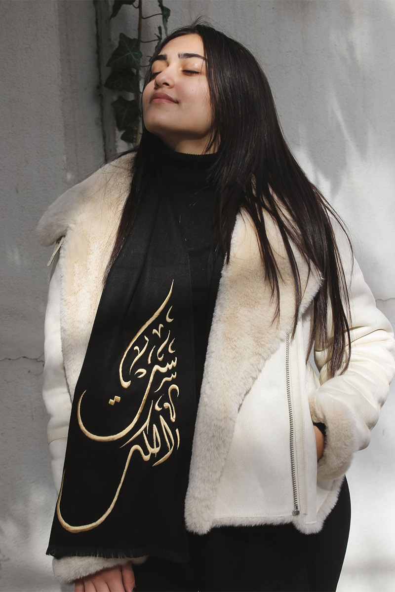 Horouf black scarf embroidered with gold threads with a meaningful sentence in arabic